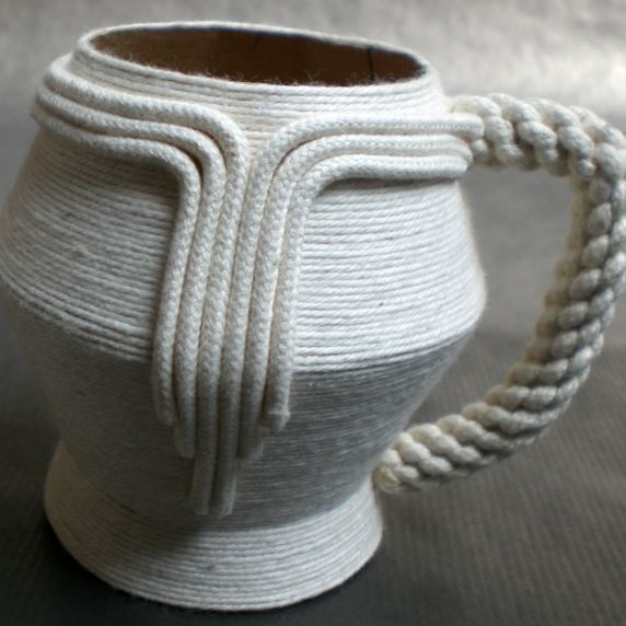 Paper and string tea cup